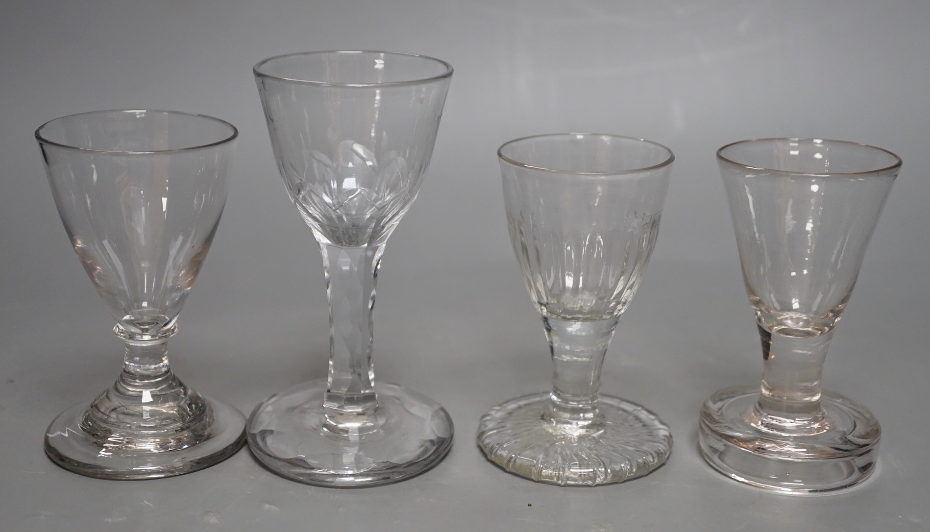 Four 18th and 19th century assorted toasting glasses, tallest 12cms high